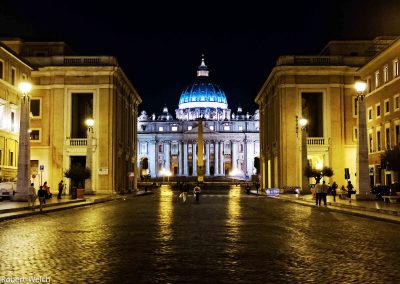 "a night view of St. Peter's Basilica from via della Conciiazione"