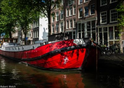 red boat tied up in Amsterdam