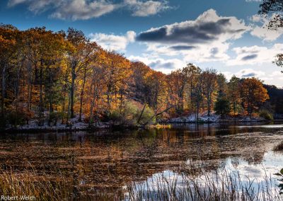"snow, winter clouds and the last of colorful leaves at Eastman Lake, first photo"