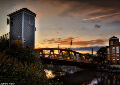 sunset over an Erie Canal lift bridge at Fairport, NY