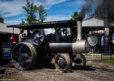 A.D. Baker steam tractor takes on coal