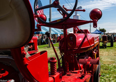 wide view down the length of a 1940's Farmall tractor