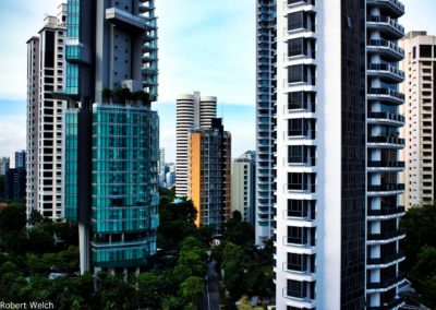 early evening image of modern high rise residences in tropical Singapore