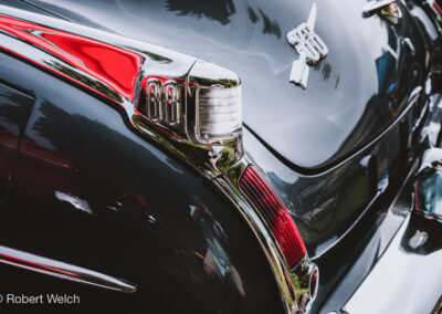 "quarter view of taillight and bodywork on vintage Oldsmobile 88"