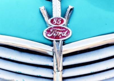 badge and grille detail of a vintage Ford truck